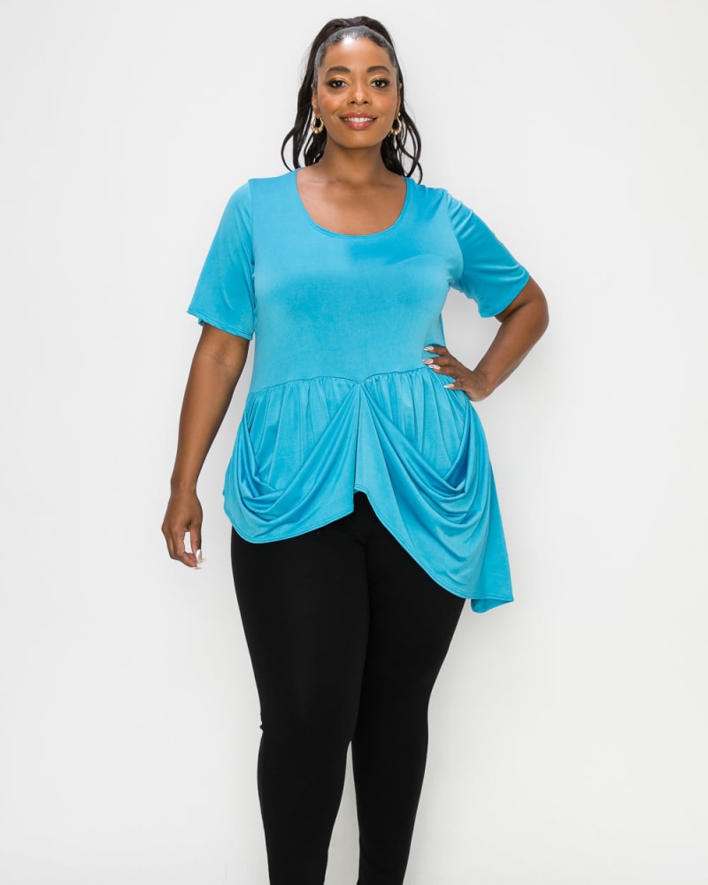 Front of a model wearing a size 1X Savannah Draped Peplum Top in Turquoise by L I V D. | dia_product_style_image_id:375468